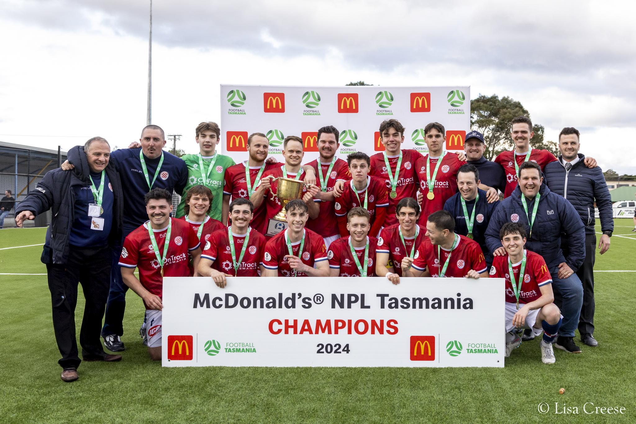 A picture of the Glenorchy Knights NPL team after winning the 2024 trophy