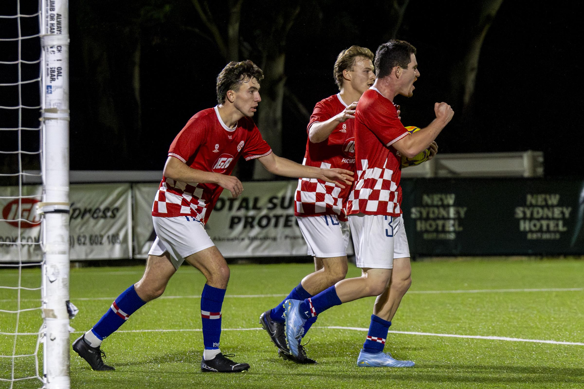 Mathew Brkic celebrates his late equaliser for Glenorchy against Riverside. Picture by Lisa Creese