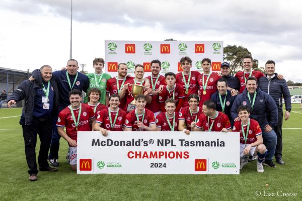 A picture of the Glenorchy Knights NPL team after winning the 2024 trophy