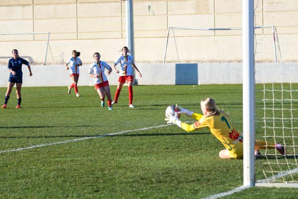 Ebony Pitt and Amelie Millar in action for the Under 15 State team in 2024.