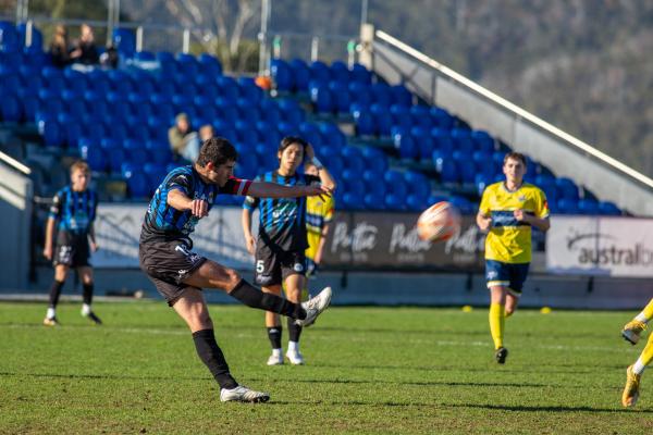 Kingborough captain Eli Luttmer launches a clearance against Devonport Round 16 picture courtesy KLUFC.