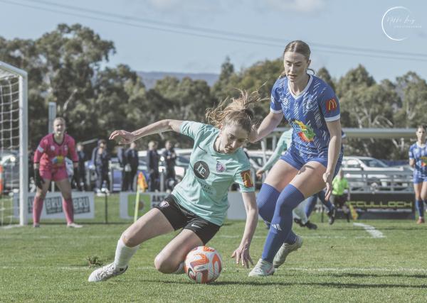 South Hobart's Caitlin Stalker guards the ball from Amelia Wing of Launceston United. Picture by Nikki Long.