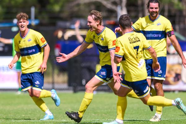 Connor Parke of Devonport celebrates a goal against Ulverstone. Photo by Simon Sturzaker