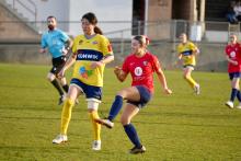 South Hobart & Devonport Strikers Players to the ball