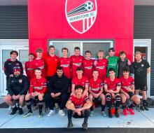 Ulverstone Soccer Club players outside their clubrooms